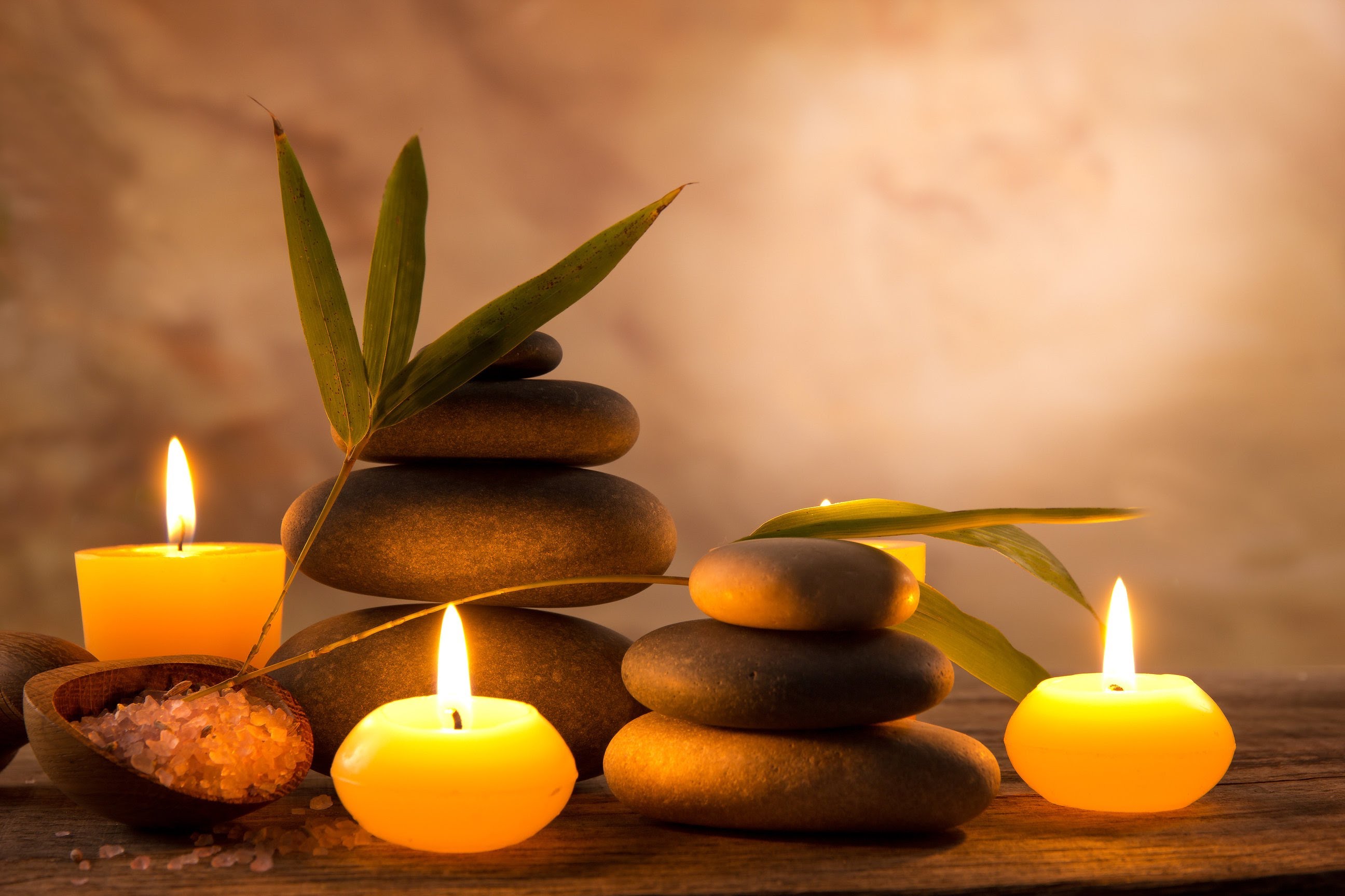 relaxing candle and zen rocks